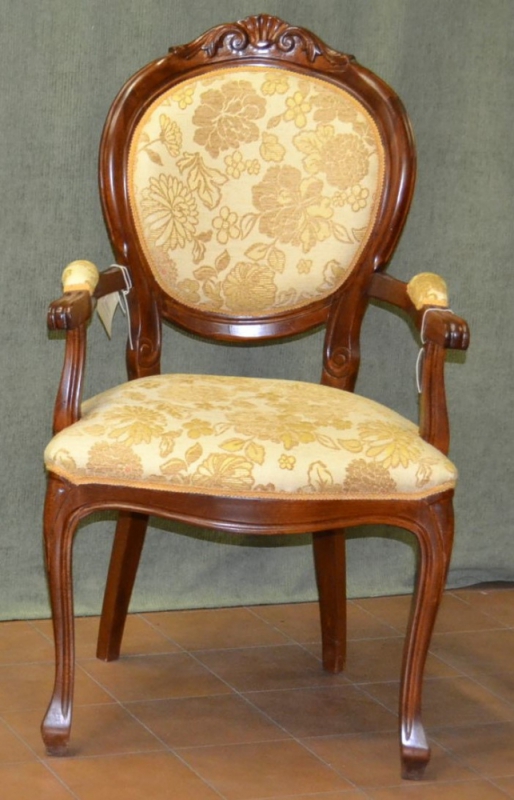 Poltrona modello "Ovalina " con cresta intagliata e gambe a sciabola ART POL 16