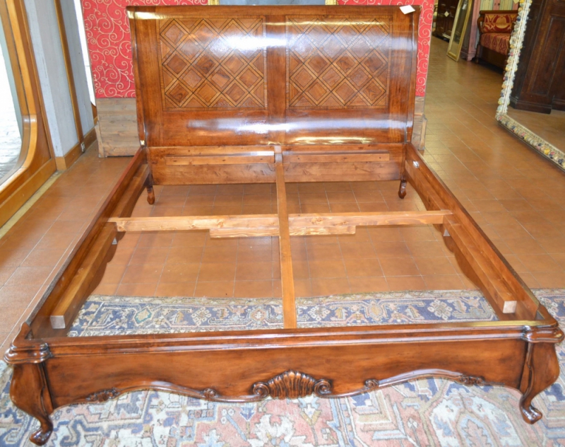Double bed with inlays and cubes patterned decoration