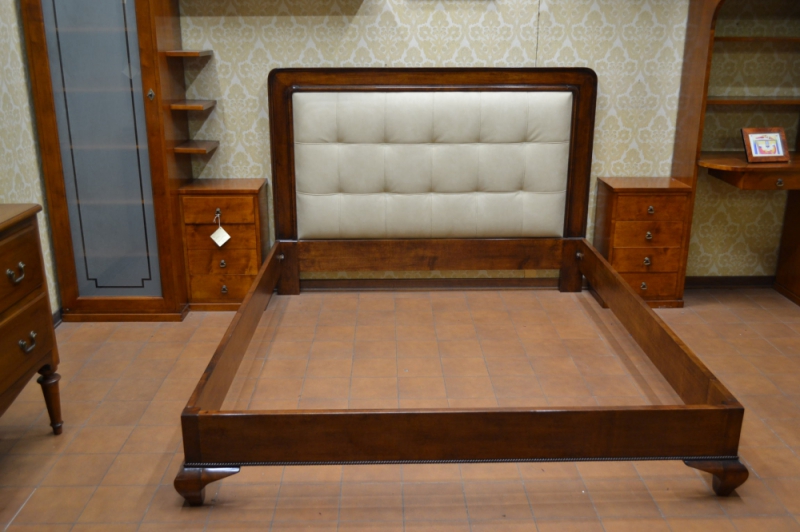 Double bed with leather headboard